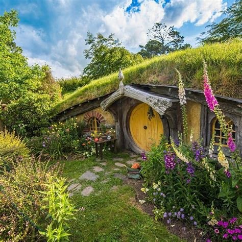 hobbit house with metal roof|decorating a hobbit house.